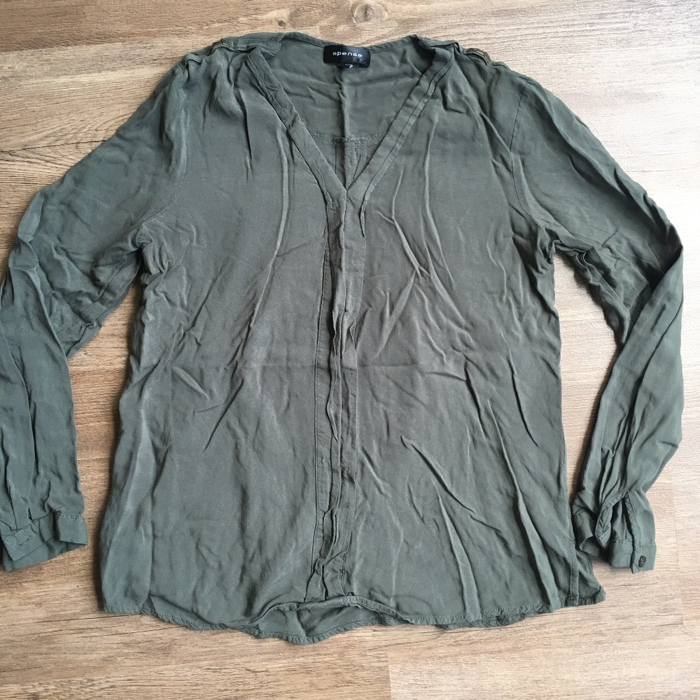 Olive tunic with brass stud detailing on shoulder